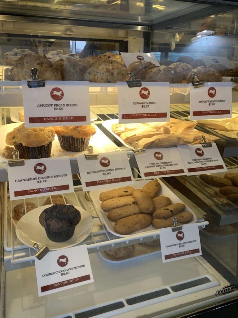 Bakery case with muffins and pastries